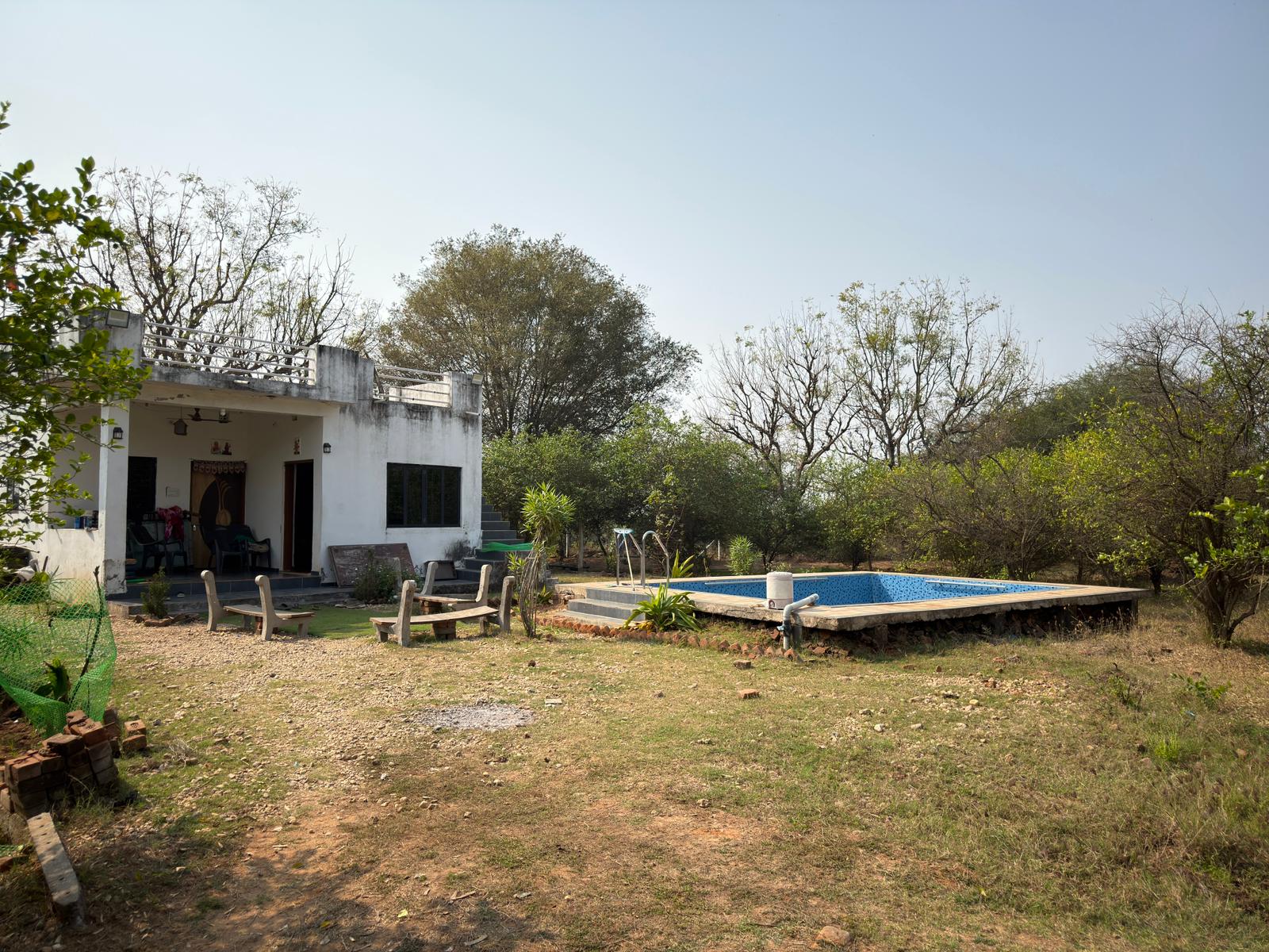 Pitruchaya – Spacious Farmhouse Near Ahmedabad with Swimming Pool